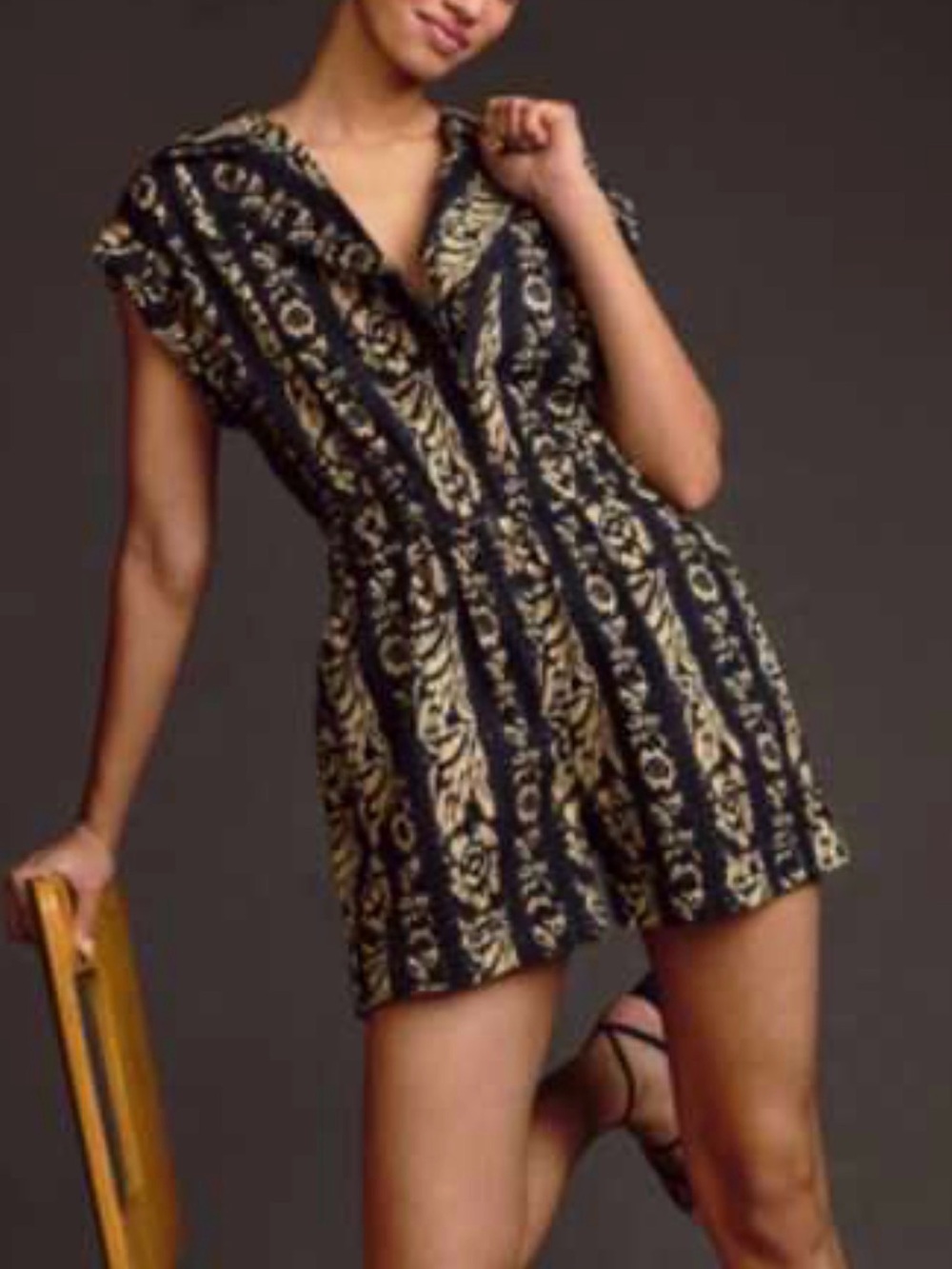 Anthropologie Black and Gold Patterned V-Neck Romper